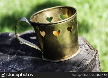 Metal cups with heart shapes.