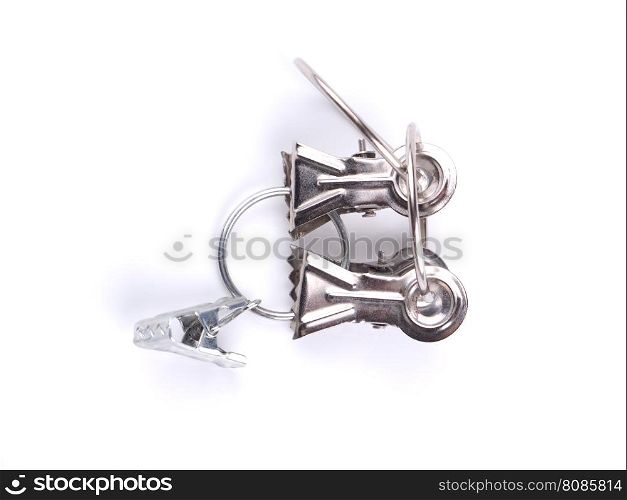 Metal fasteners for curtains on a white background