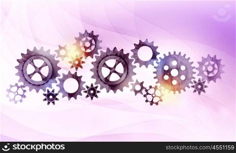Metal gears and cogwheels. Mechanism of metal gears and cogwheels on color background