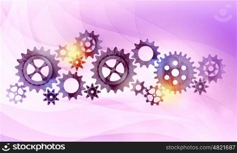 Metal gears and cogwheels. Mechanism of metal gears and cogwheels on color background