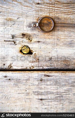 metal gray morocco in africa the old wood facade home and rusty safe padlock
