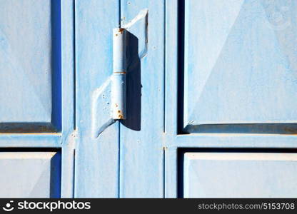 metal grey morocco in africa the old wood facade home and rusty safe padlock