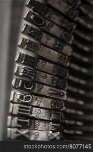 Metal letters on typewriter. Close up macro