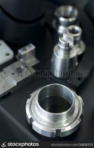Metal machine parts. Vertical imagel