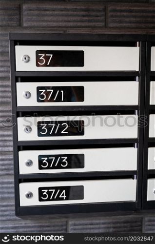 Metal mailboxes in a modern apartment building. Metal mailboxes in a modern apartment building.