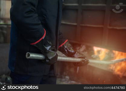 metal melting factory. Industrial worker in metal melting factory