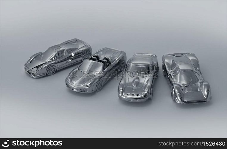 Metal models of luxury sports cars in a row. Luxury sports cars