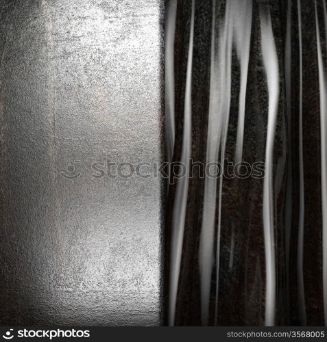 Metal on black silk curtain