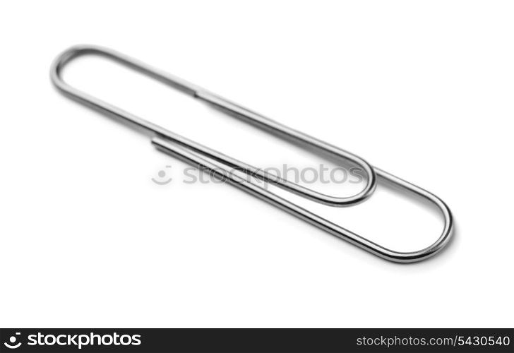 Metal paper clip isolated on white
