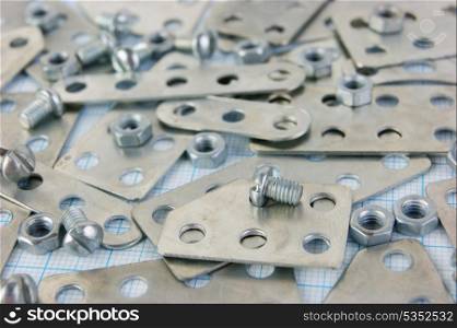 metal parts for constructi on on graph paper