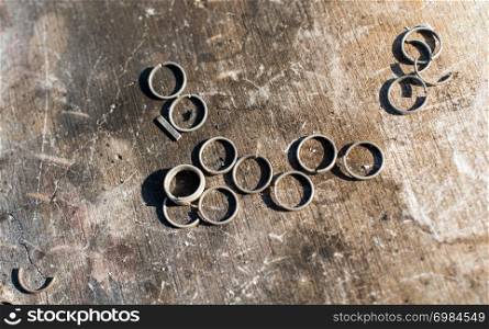 metal pieces of round ring shape on dark background
