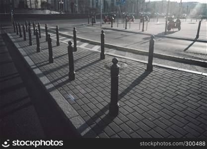 Metal pillars for parking facing at Warsaw, Poland