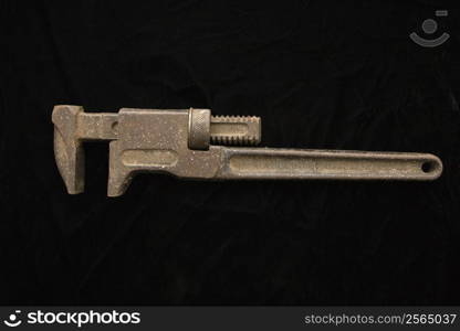 Metal pipe wrench.