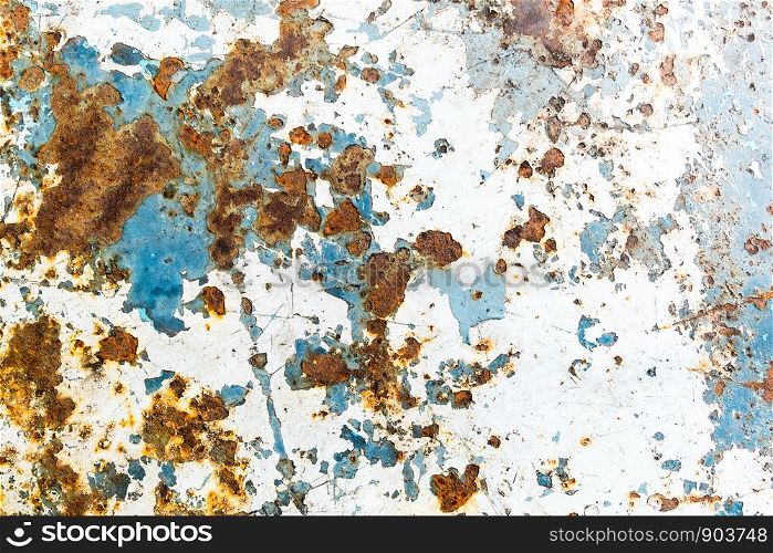 Metal Rust Texture Background. Beautiful unusual background. Rusted white painted metal wall. Rusty metal background with streaks of rust. Rust stains.