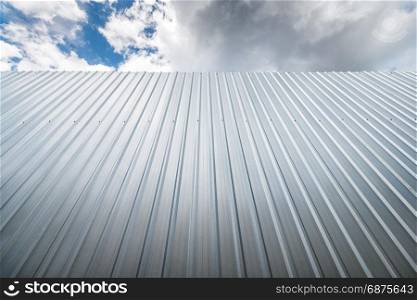 metal sheet wall against blue sky
