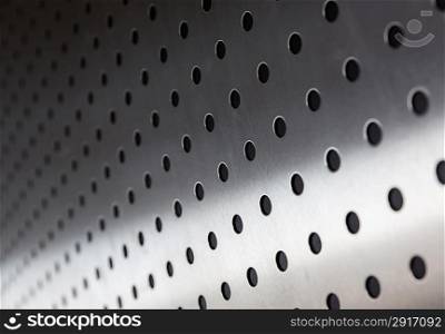 metal sheet with holes, close upphoto