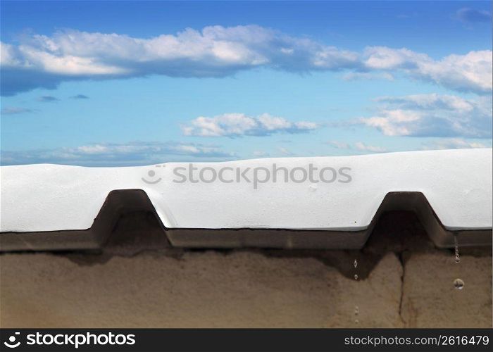 metal snow roof meltwater cross section blue sky