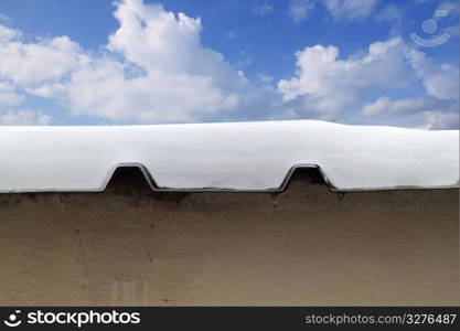 metal snow roof meltwater cross section blue sky