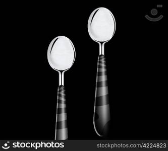 metal spoon on black background