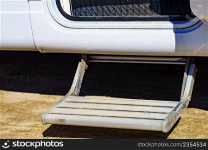 Metal steps of c&er car recreation vehicle. Travel in motorhome, holidays.. Metal steps of c&er car