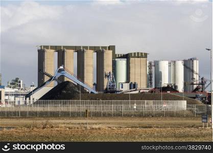 metal storage silo on the second maasvlakte in industrial area europoort in Holland