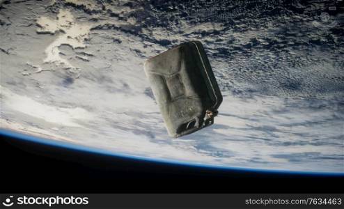 metal vintage and dirty jerrycan on Earth orbit, elements furnished by Nasa. metal vintage and dirty jerrycan on Earth orbit