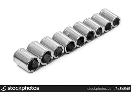 Metal wrench sockets close up isolated on a white background