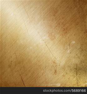 Metallic background with a grunge gold brushed metal effect
