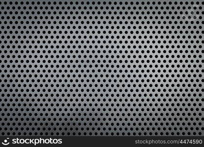 Metallic background with perforation of round holes