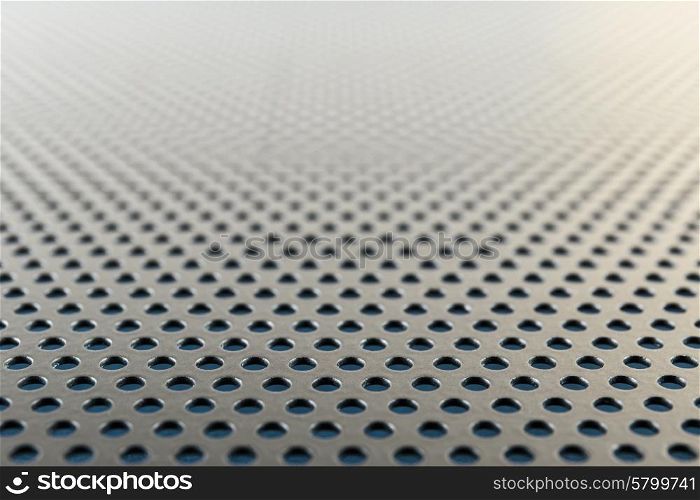 Metallic background with perforation of round holes