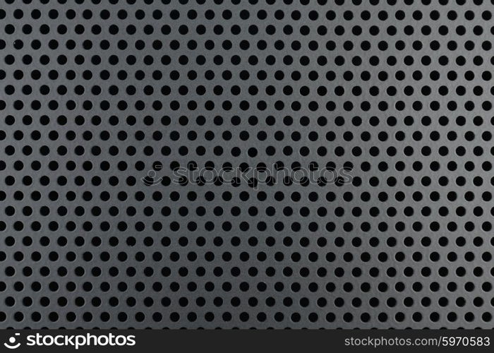 Metallic background with perforation of round holes