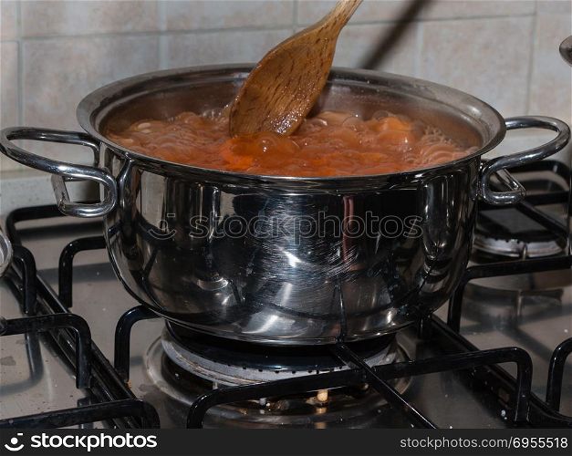 Metallic Pot with Italian Style Tomato Sauce.