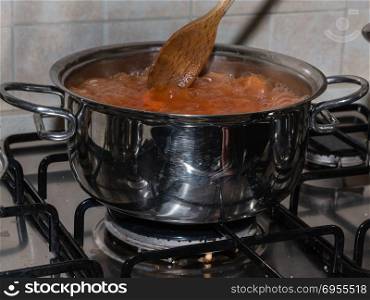 Metallic Pot with Italian Style Tomato Sauce.