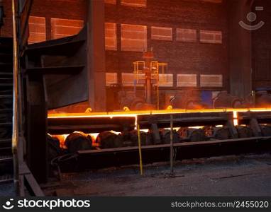 Metallurgical factory in Germany, hot rolled metal conveyor, sheet steel production.. Metallurgical factory