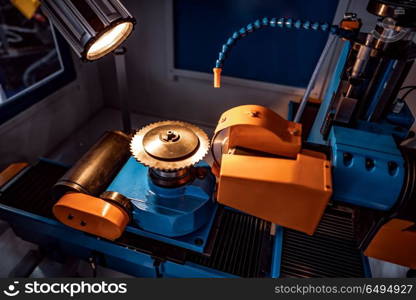 Metalworking CNC milling machine. Cutting metal modern processin. Metalworking CNC milling machine. Cutting metal modern processing technology. Small depth of field. Warning - authentic shooting in challenging conditions. A little bit grain and maybe blurred.