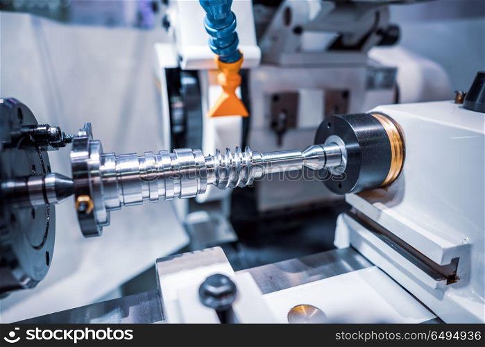 Metalworking CNC milling machine. Cutting metal modern processin. Metalworking CNC milling machine. Cutting metal modern processing technology. Small depth of field. Warning - authentic shooting in challenging conditions. A little bit grain and maybe blurred.