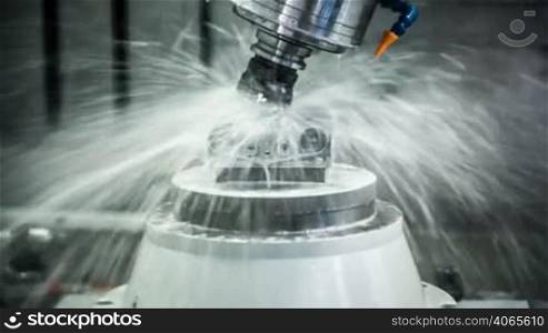 Metalworking CNC milling machine. Cutting metal modern processing technology.