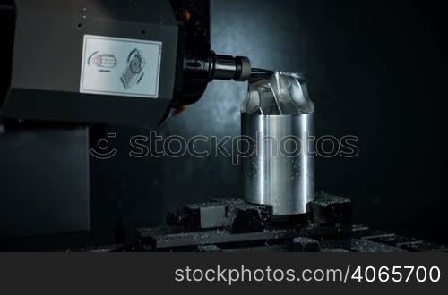 Metalworking CNC milling machine. Cutting metal modern processing technology.