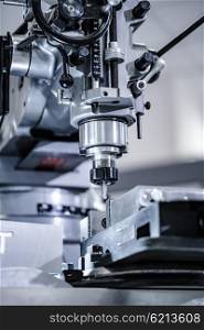 Metalworking milling machine. Cutting metal modern processing technology.