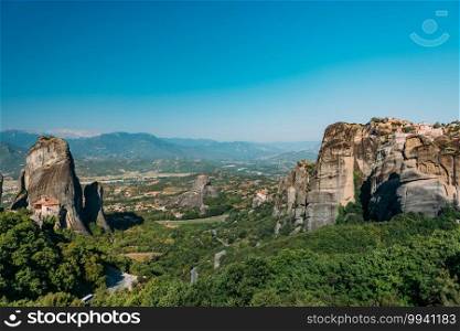 Meteora monasteries, Greece. Four monasteries are visible in this shot, with Kalambaka valley in the back