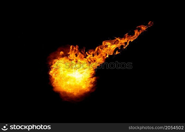 Meteorite fireball with fiery braid isolated on black background
