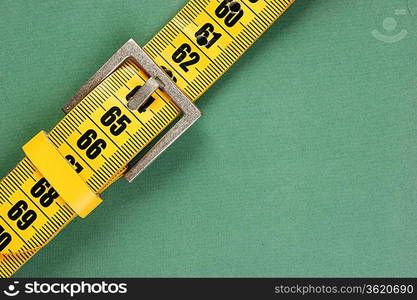 meter belt slimming on the green background