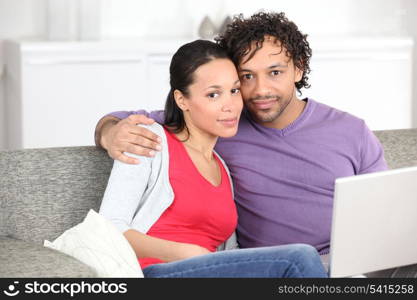 Metis couple doing computer