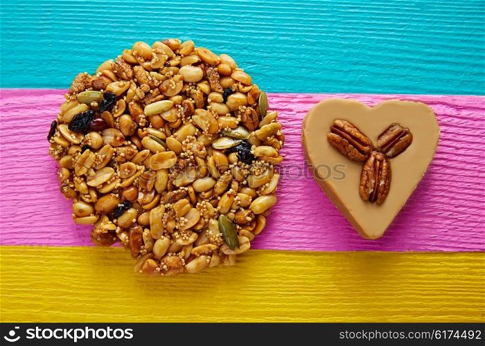 Mexican candy sweets Palanqueta with peanuts and cajeta heart with pecan nuts
