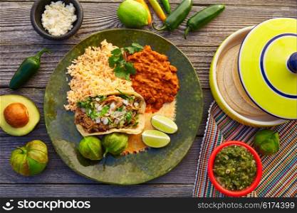 Mexican carnitas tacos with salsa and Mexico food ingredients