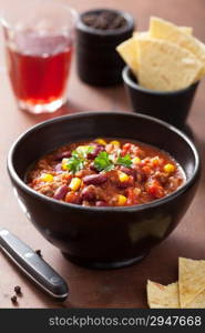 mexican chili con carne in black bowl