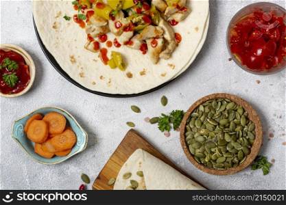 mexican food burrito near vegetables cardamom seeds