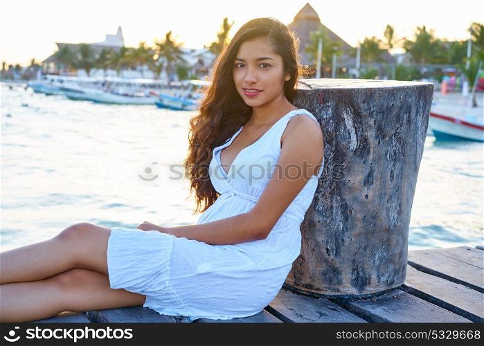 Mexican latin woman at Caribbean sea of Riviera Maya in Mexico