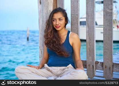 Mexican latin woman relaxed at Caribbean sea of Riviera Maya in Mexico