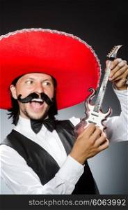 Mexican man with guitar in music concept